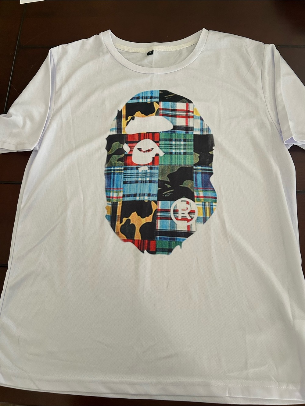 BAPE White Men’s Graphic T-Shirt with Multicolor Plaid Ape Design